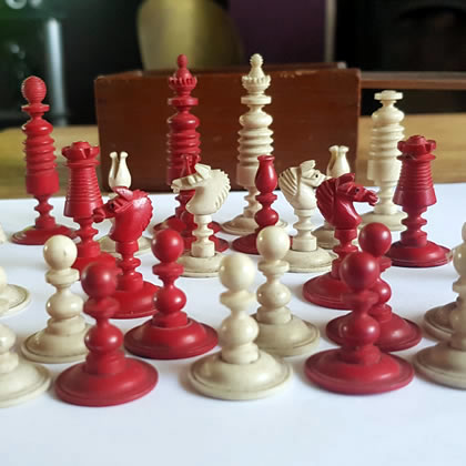 A retro antique chess board and pieces
